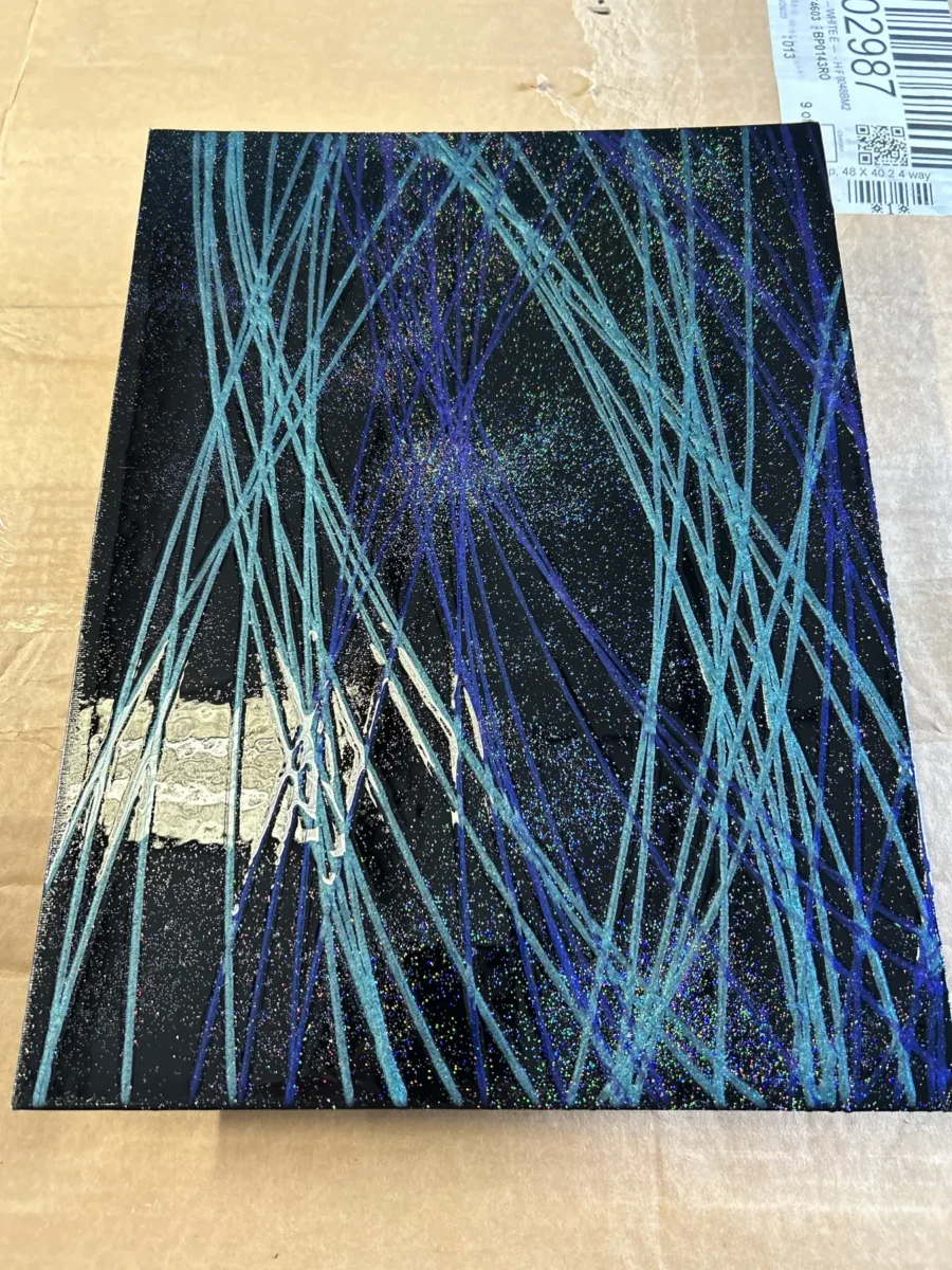 Abstract resin panel with flowing lines
