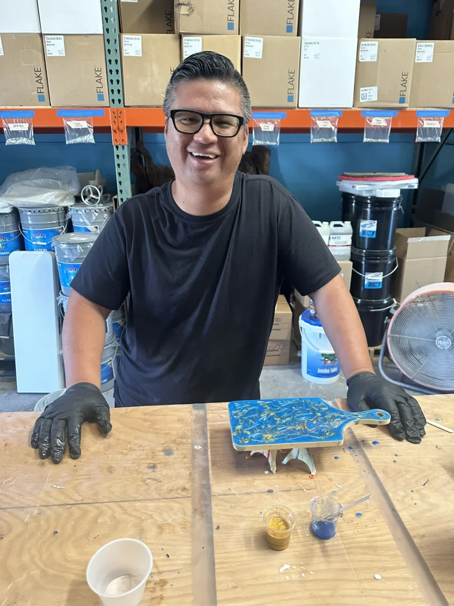 Participant with a finished resin piece