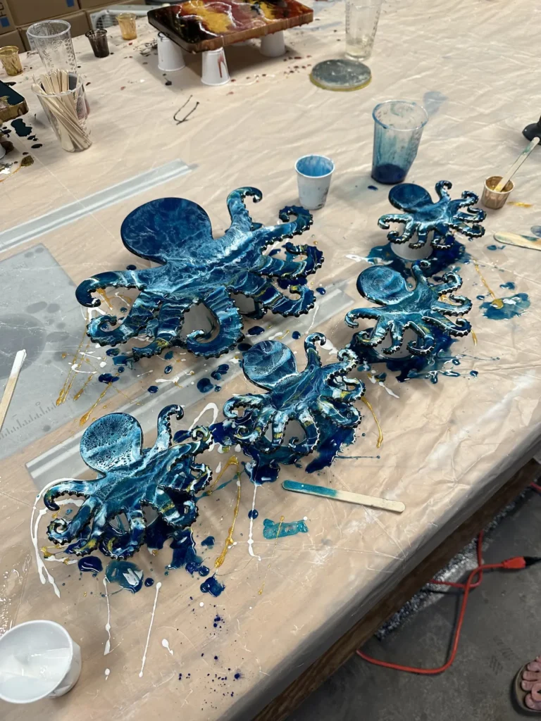 Class pieces in blue resin on the workbench