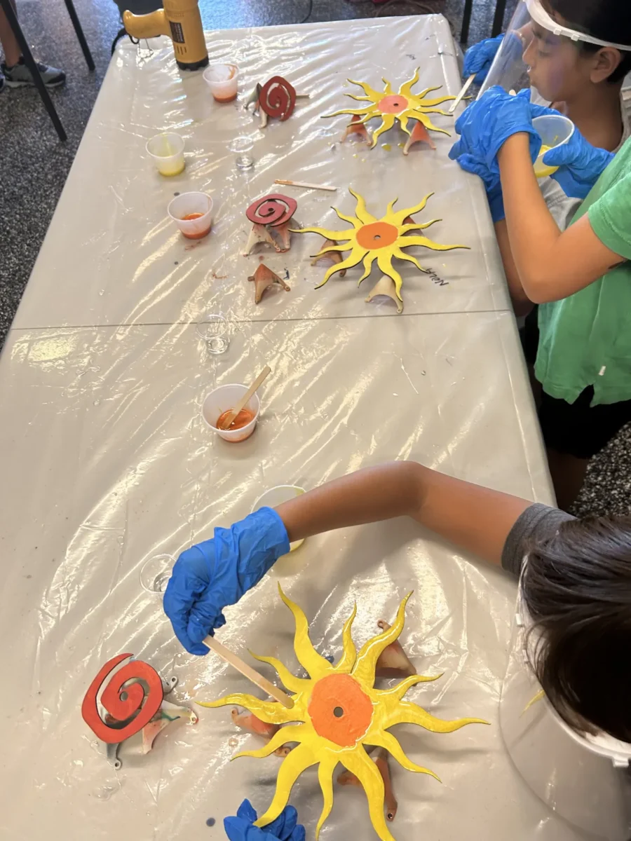 Sun cutouts being poured during a class