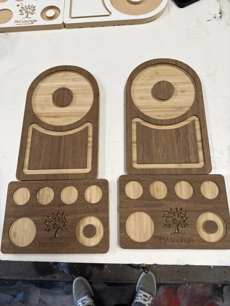 CNC-cut wood cutouts ready for resin