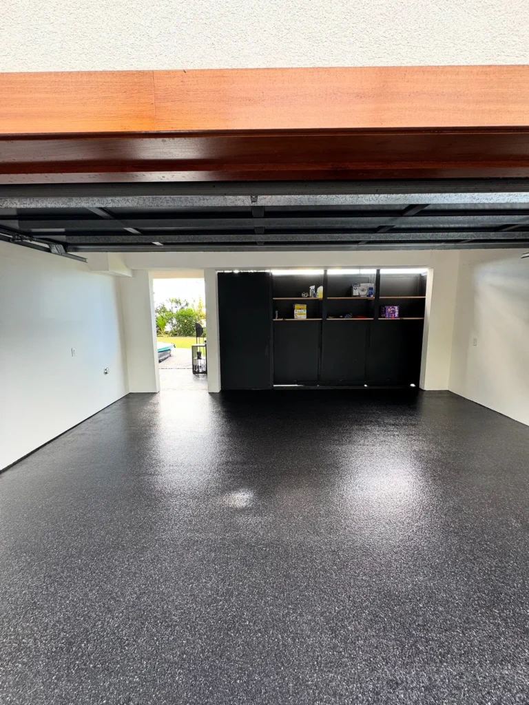 Dark decorative flake floor in a large garage