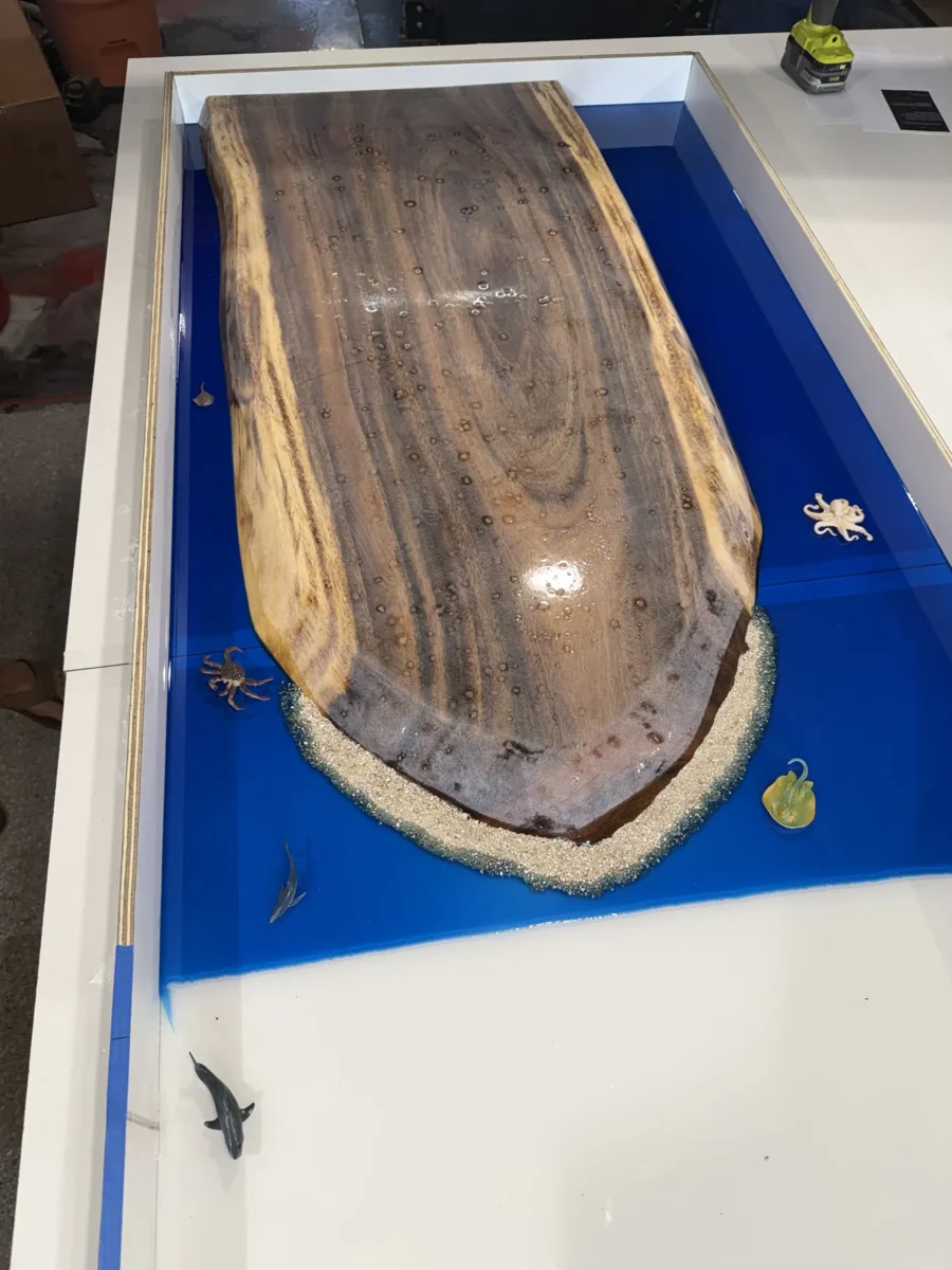 Live-edge slab and resin during the pour
