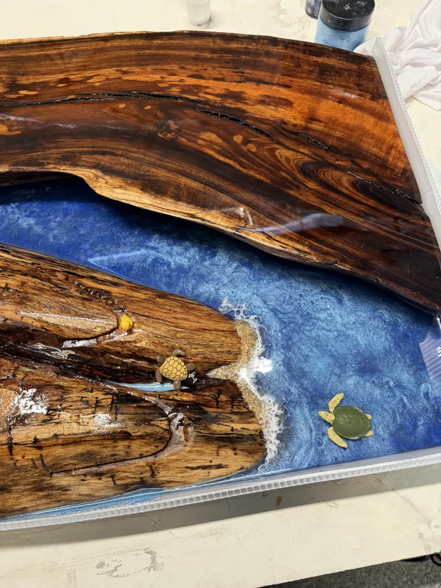 Live-edge slab with a blue resin river